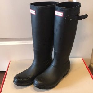 Flat black hunter boots